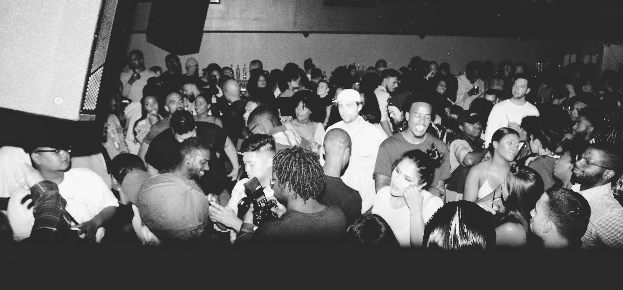 Black-and-white crowd shot from a HEAT event