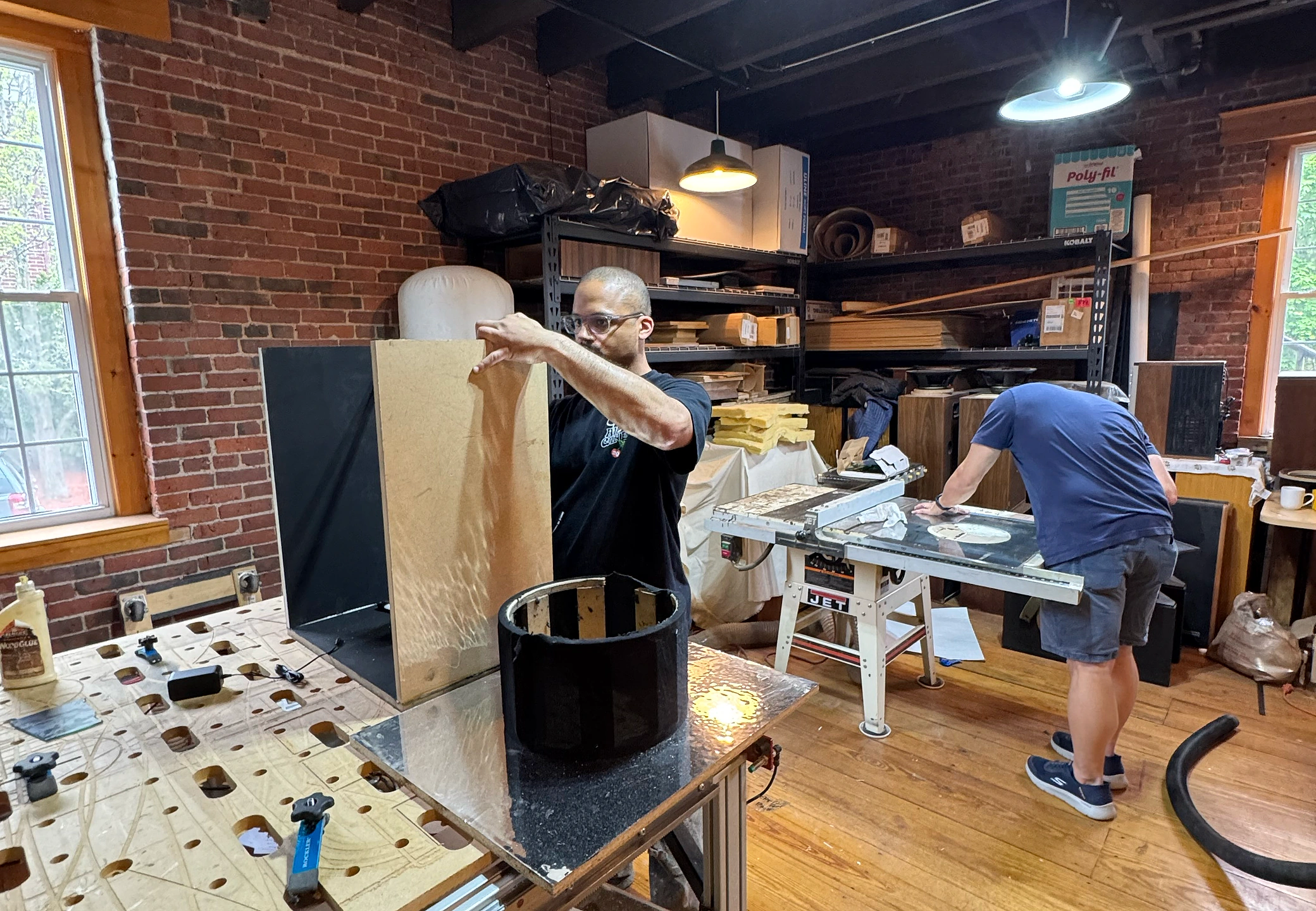 Building the wooden enclosure in the shop — plywood cabinet on the workbench